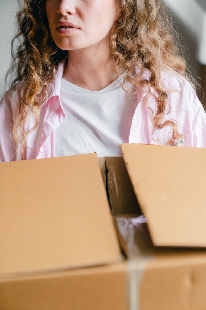 Woman holding a box