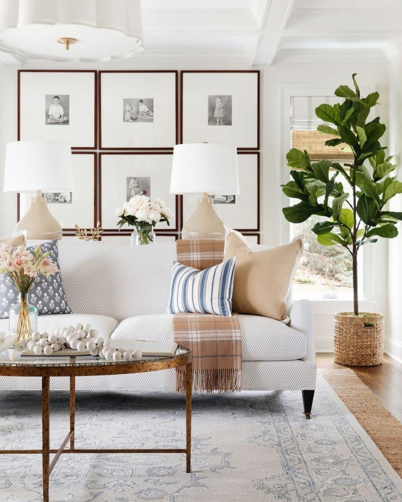 Gorgeous traditional living room with picture frames