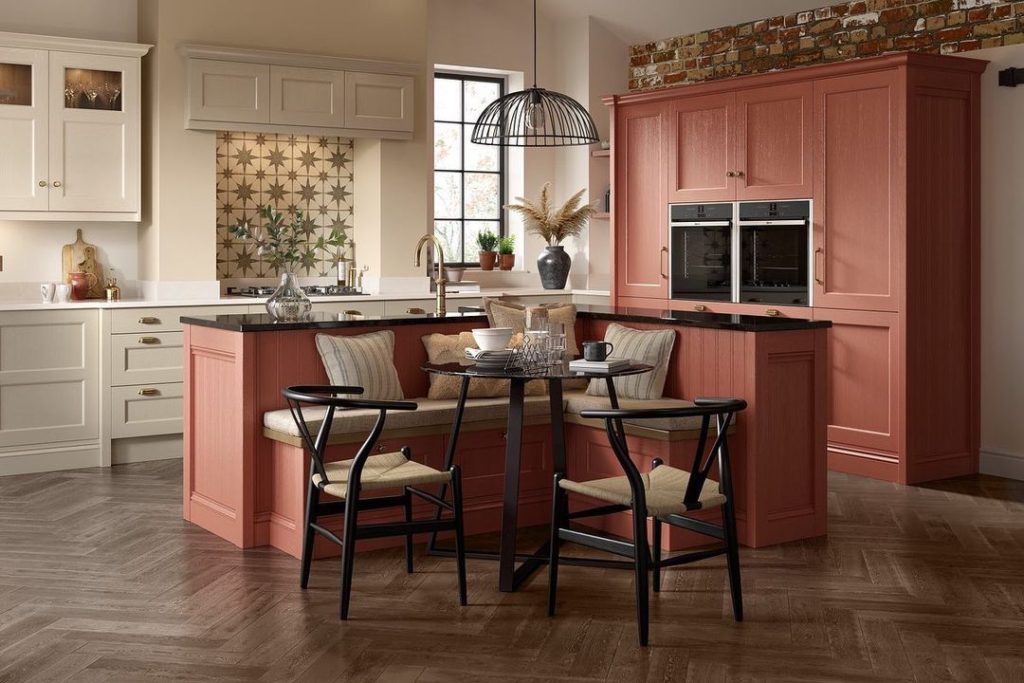 Cozy country kitchen breakfast nook in warm Pimento color.