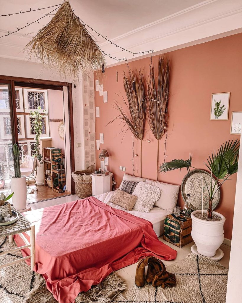 Eclectic and colorful boho bedroom in Marrakesh Morocco.