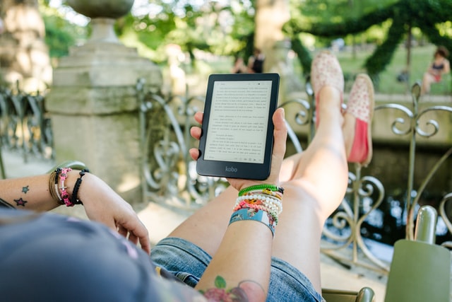 Lady reading an e-book